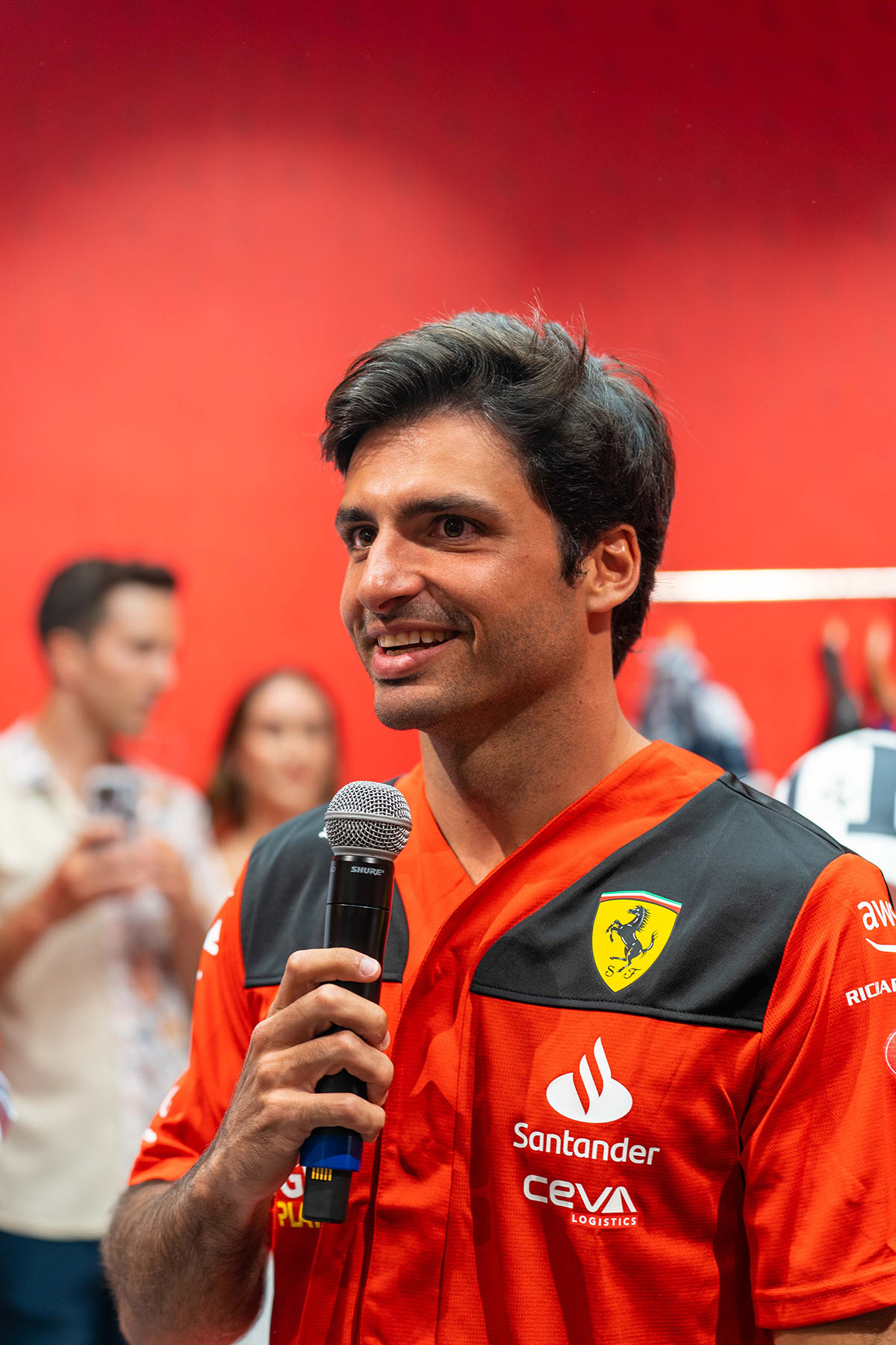 Man speaking at the Aventura Mall Ferrari Formula 1 Event