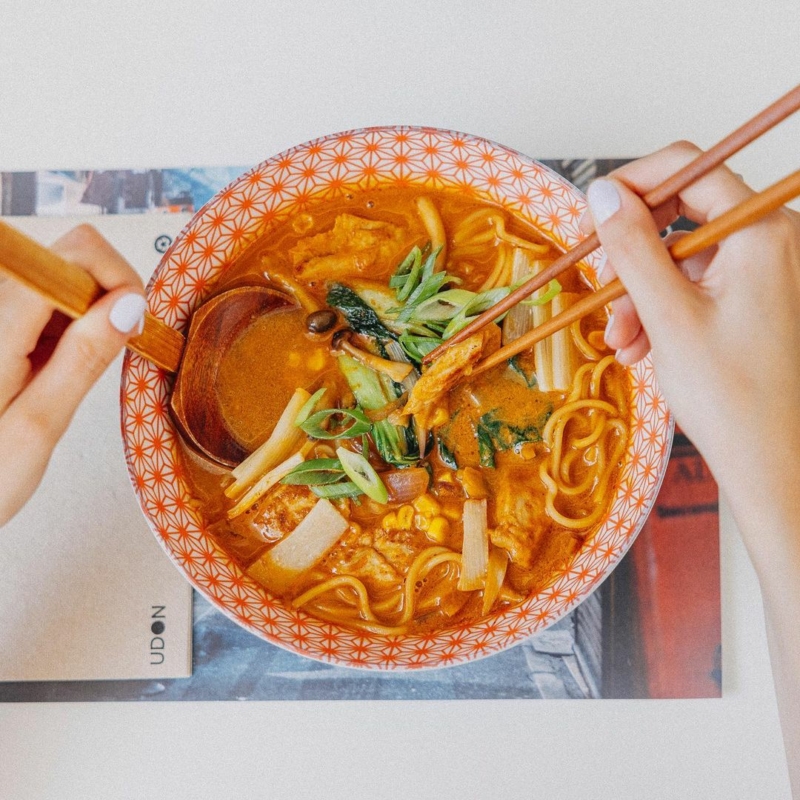 UDON's Vegan Ramen with vegetable broth and miso, plant-based protein, bamboo slices, red onion, cabbage, shimeji mushrooms, and corn at Aventura Mall